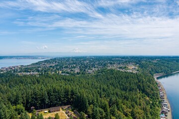 Fototapeta na wymiar Aerial view of Point Defiance and Mount Rainier from Tacoma, Washington in June
