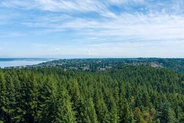 Aerial view of Point Defiance and Mount Rainier from Tacoma, Washington in June