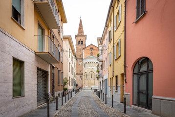 a street in Fidenza city with a view to the Cathedral, province of Parma, region of Emilia Romagna, Italy