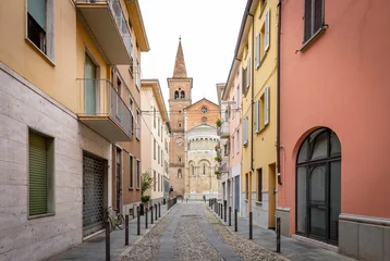 Foto op Plexiglas a street in Fidenza city with a view to the Cathedral, province of Parma, region of Emilia Romagna, Italy © Jorge Anastacio
