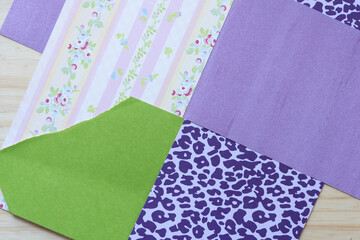 decorative scrapbook paper background with purple or violet color scheme