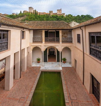 House of Zafra Courtyard with Alhambra on background - Granada, Andalusia, Spain