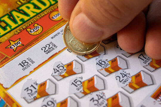 Lottery scratch card. Scratch card lottery, fortune ticket. Scratch the lucky numbers with the coin. Illustrative editorial
