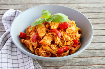 chicken breast with pepper and noodles