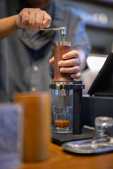 Fototapeta na wymiar Close-up of espresso pouring from coffee machine in cafe , Barista making fresh
