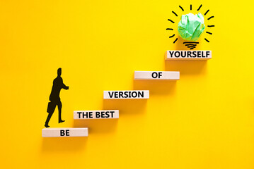 Motivational inspirational symbol. Concept words Be the best version of yourself on wooden block. Beautiful yellow background Businessman icon. Business motivational inspirational concept. Copy space.