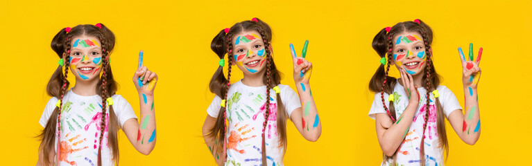 A charming child with painted palms with multicolored paints shows one, two, three and fingers. A little girl happily draws with her hands. Yellow isolated background. Collage