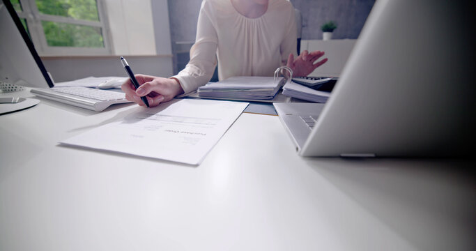 Public Tax Accountant Using Calculator