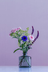 Beautiful bouquet in a glass vase.