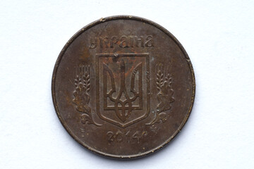 the reverse of a 2014 Ukrainian 25 kopeck coin that has been in circulation and has significant...