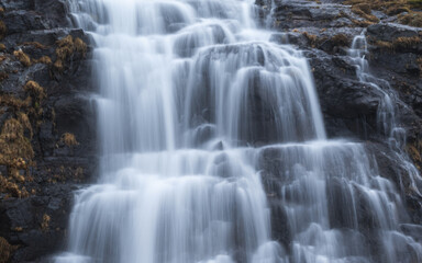 Fototapeta na wymiar Long exposure waterfall, misty water