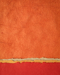 abstract landscape in red and orange - collection of Huun papers handmade in Mexico, vertical background - obrazy, fototapety, plakaty