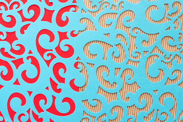 card stock paper background with blue die-cut sheet with fancy shapes