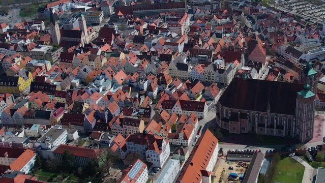 Aerial around the old town Ingolstadt in Germany on a sunny day in spring