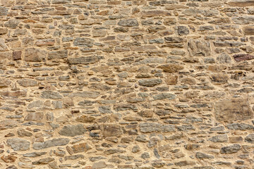 Background of stone wall texture. Closeup of stone wall texture.