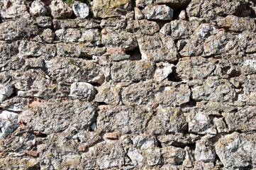 Rough gray stone wall texture