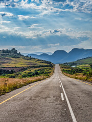 Road through rolling hills and mountain, Panorama Route, Mpumalanga, South Africa