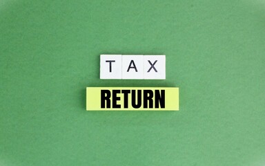 alphabet letters with the word tax return. Income Tax Return Deduction Refund Concept