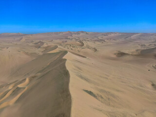 Fototapeta na wymiar Aerial drone panorama of huacachina desert in Peru close to Ica