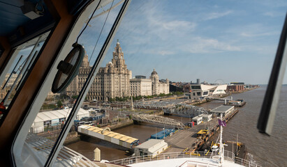 Liverpool, England, UK. 2023. View from the bridge of  a cruise ship along the famous waterfront of Liverpool and the River Mersey.