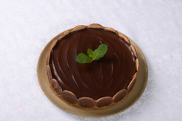 dutch tart on white tablecloth