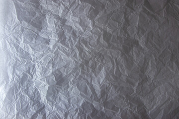 Crinkled white paper light and shadow background