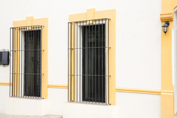 Building with beautiful windows and steel grilles