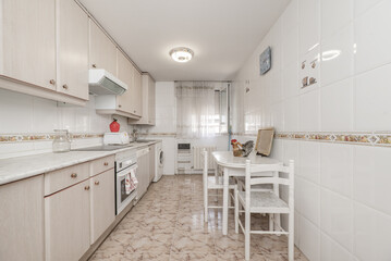spacious kitchen furnished with old-fashioned decor