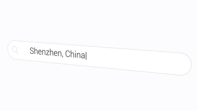 Typing Shenzhen, China In Computer Browser. Web Search. Special Economic Zone. closeup