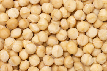 Fototapeta na wymiar Macadamia nuts pattern texture background, top view, flat lay.