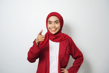 Asian business Muslim woman ini red casual smiling happy and looking confident