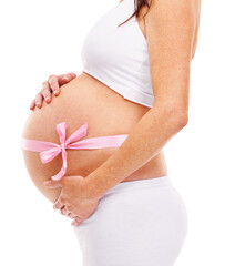Closeup, pregnancy and woman with a ribbon, stomach and growth isolated against a transparent background. Zoom, female person or mother with a ribbon, pregnant or belly with wellness, abdomen and png