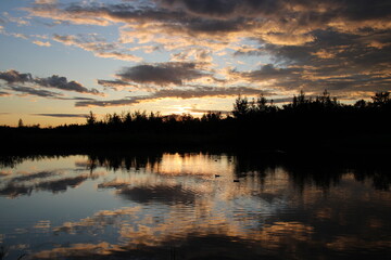 Fototapeta na wymiar Reflections Of Sunset, Pylypow Wetlands, Edmonton, Alberta