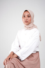 Fashion portrait of young beautiful asian muslim woman with wearing hijab isolated on white background. 