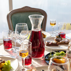 Wine in a glass decanter on a table in a restaurant