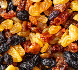 Multicolored raisins as a background. Macro