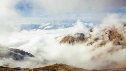 A hazy view of the high peaks of the mountains. Upper Svaneti, Mestia, Georgia, Europe.