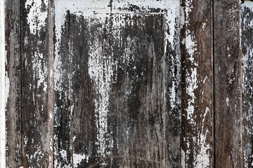 Old wood plank wall or old wooden house wall with mark paint and crack for vintage antique wood background texture.