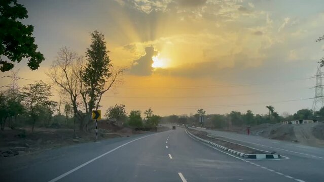 sunset on the highway, empty highway at evening, driving on the highway