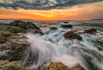 Fototapeta na wymiar Sunset Inspirational Ocean Birds Surreal Nature Landscape