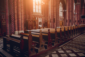 Rows of church benches at the old european catholic church.