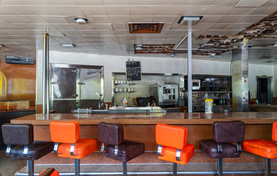 Oakridge, Oregon, USA - May 14, 2023 - The counter of the closed Sportsman's Cafe and Lounge
