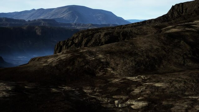 black volcanic basalt rock formations in the low light