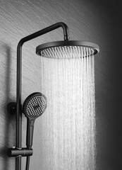 Metal shower head in the bathroom, shower head, close-up image of water coming out, dark background
