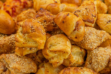 Cheese buns with spices, salty snacks. Bread with cheese filling