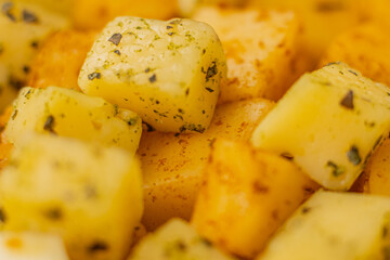 Cheese snacks in one container. Sliced cheese in different shapes. Cheese board for the celebration