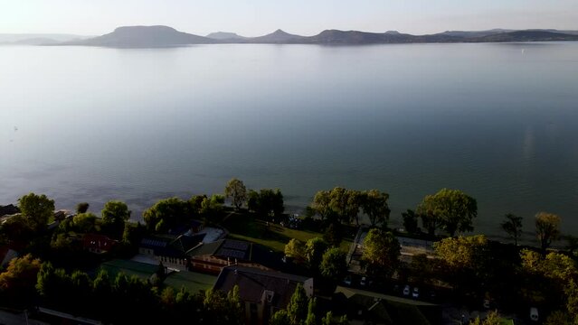 Aerial view of Lake Balaton over community of Fonyod, Hungary, quiet morning.