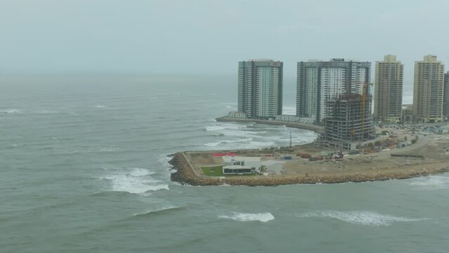 Aerial Zooming In On Emaar Construction Works With Approaching Cyclone Biparjoy In Karachi