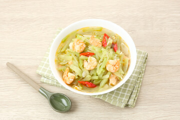 Tumis Labu Siam Udang, spicy stir fry chayote with shrimp, Indonesian traditional food
