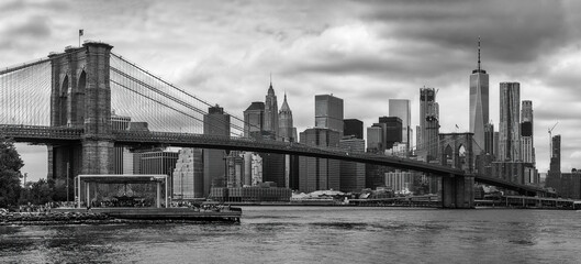 Brooklyn Bridge with Manhattan skyline in the background  in black and white